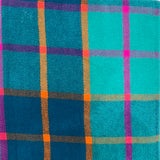 Festive check scarf in multi colours finished with tassels