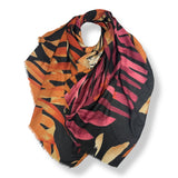 Colorful patterned scarf on a white background